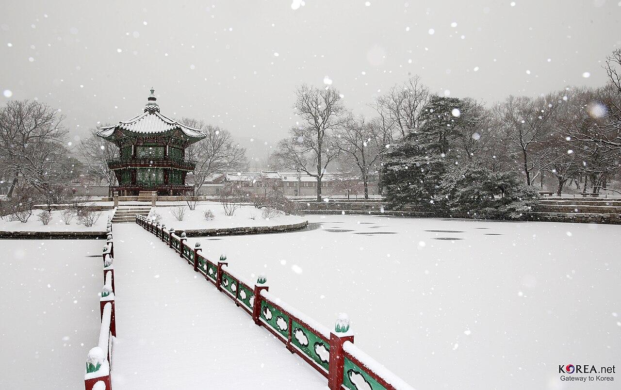 Hyangwonjeong Pavilion at Gyeongbokgung Palace in Seoul covered in snow
