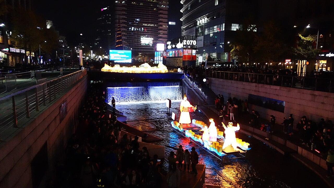 Lit lanterns floating on Cheonggyecheon Stream during the Seoul Lantern Festival