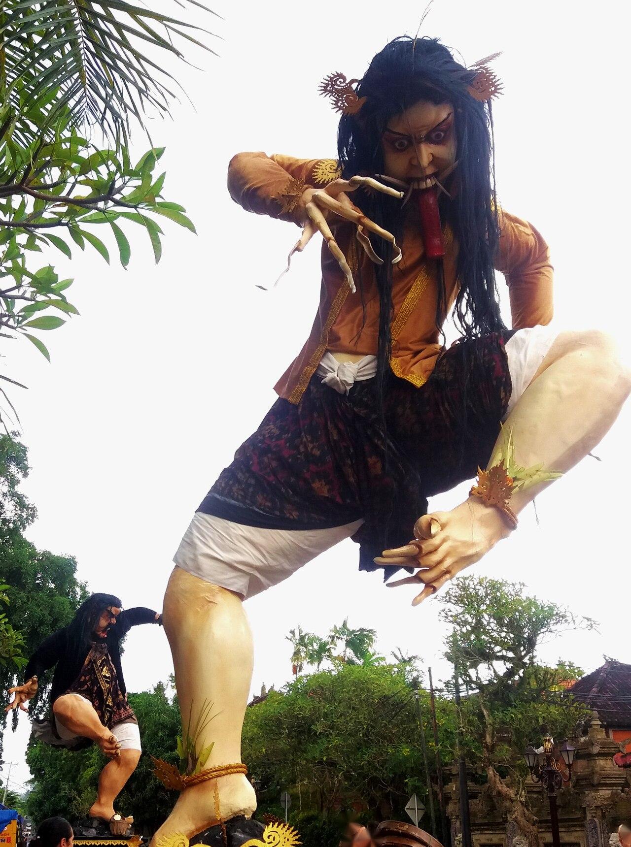 Ogoh-ogoh figure carried through Ubud before Nyepi