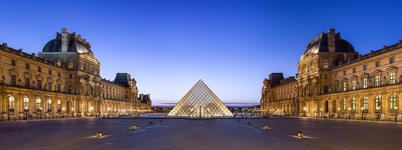 The Louvre courtyard and pyramid in Paris