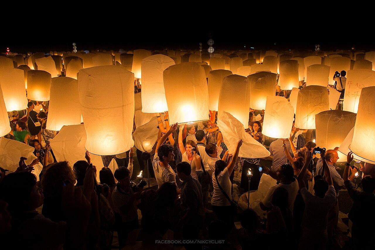 Sky lanterns rising over Chiang Mai during Yi Peng